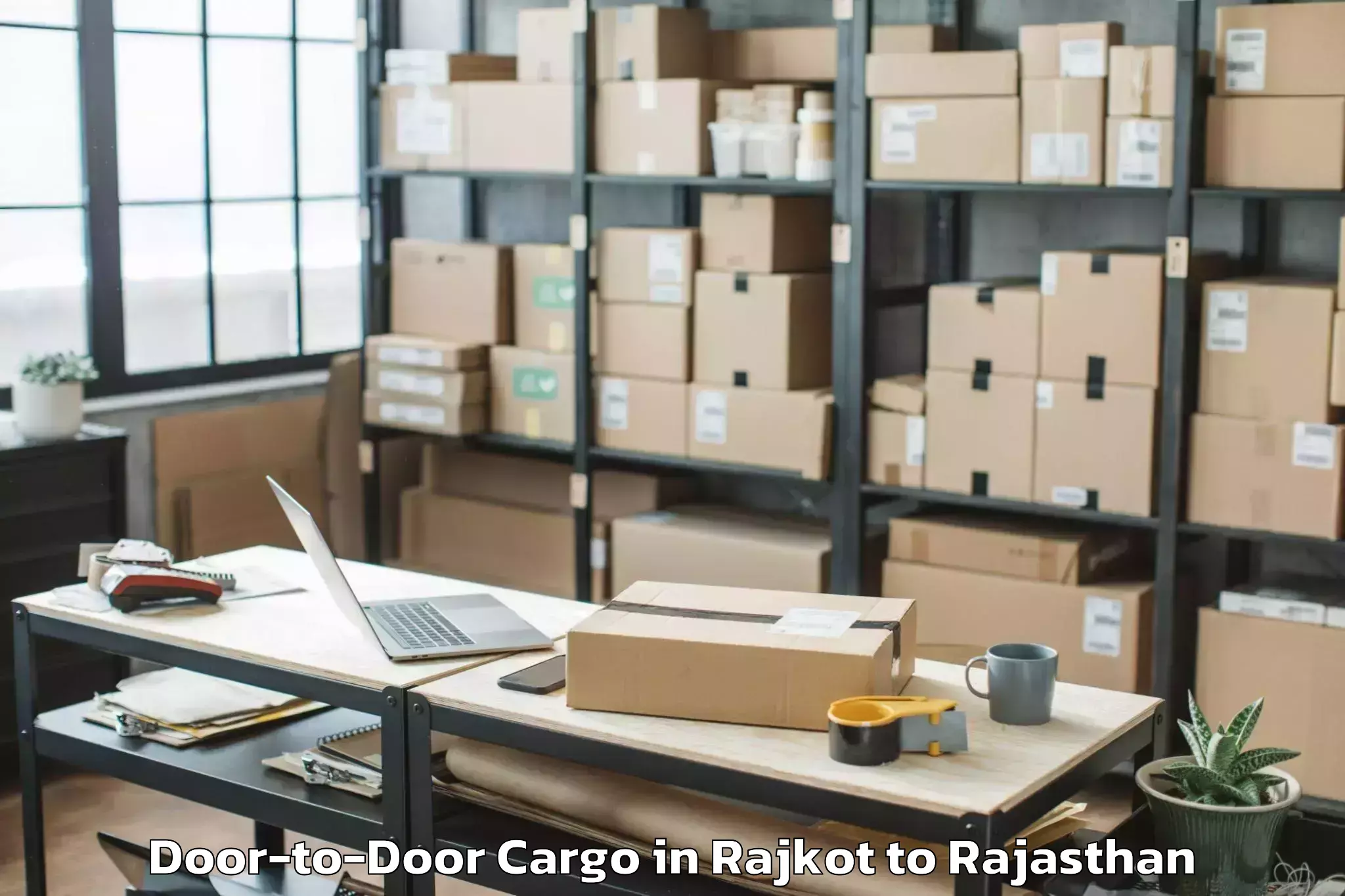 Reliable Rajkot to Iihmr University Jaipur Door To Door Cargo